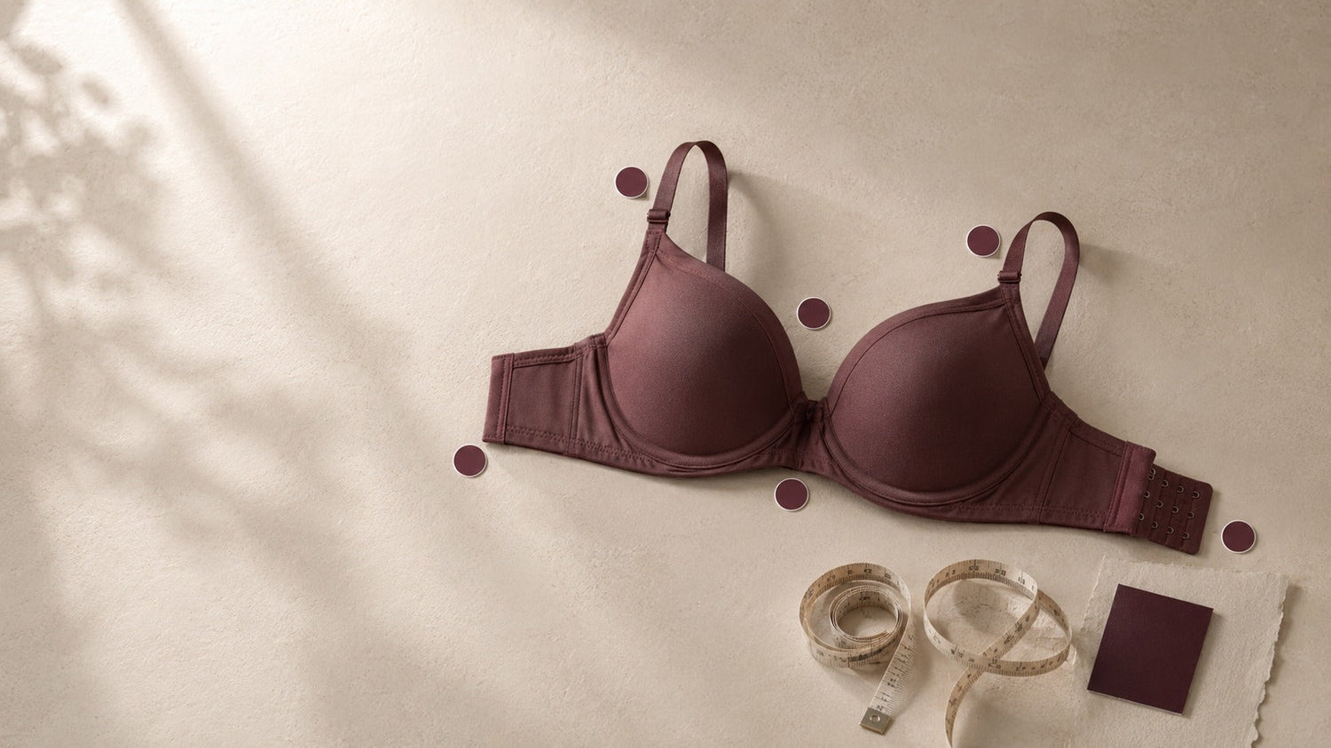 Premium flat-lay of a bra with seven visual fit checkpoints for ELORVESSA’s bra-fit article.